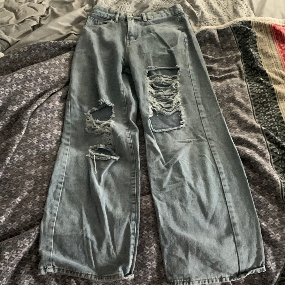 Distressed Light Wash Denim Jeans